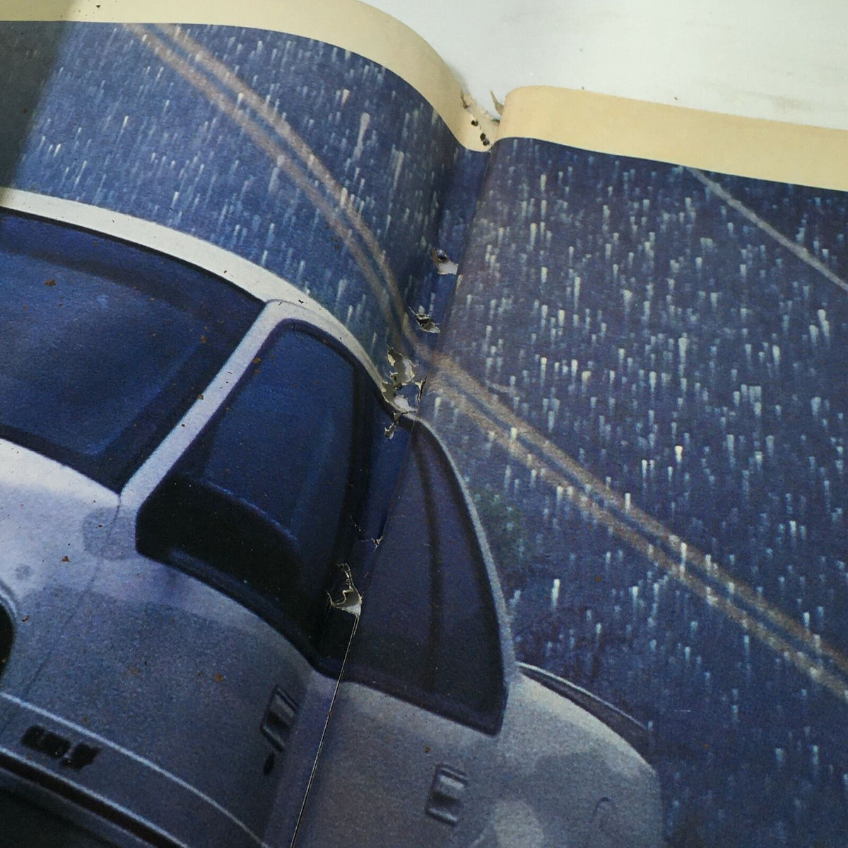 Close-up of the binding of the VTG Life Magazine January 1992 - Special Issue, showing minor wear and tear, reflecting the vintage character of the publication.