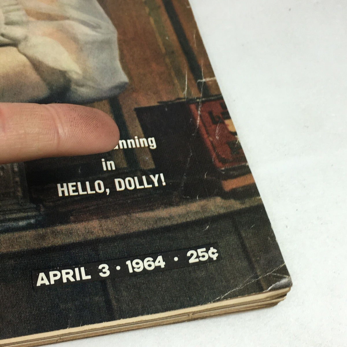 Close-up of the cover text from VTG Life Magazine April 3 1964, highlighting Carol Channing in Hello Dolly Musical with publication date and price.