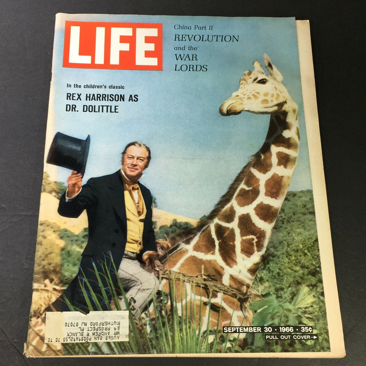 Cover of VTG Life Magazine September 30 1966 featuring Rex Harrison as Dr. Dolittle, standing beside a giraffe, showcasing vintage cinema nostalgia.