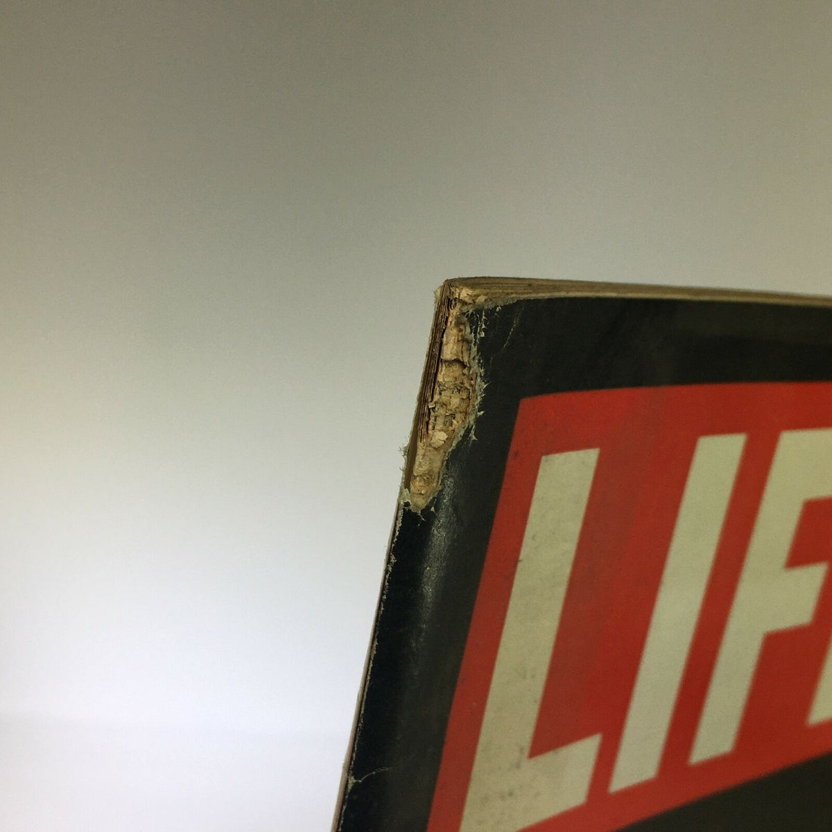 Close-up view of the spine of the VTG Life Magazine July 24 1964, showing wear and condition details, emphasizing the magazine's vintage nature and historical value.