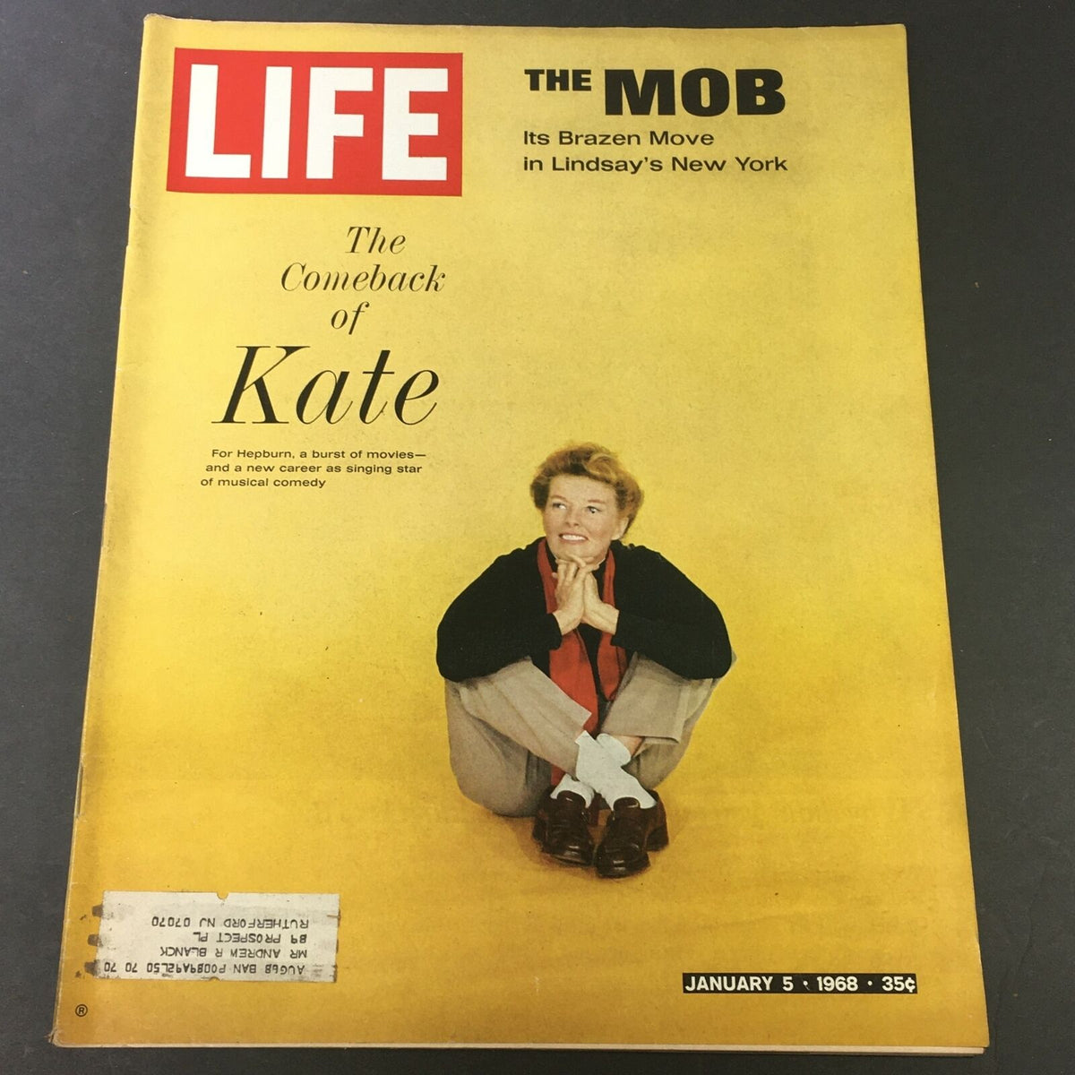 VTG Life Magazine January 5, 1968 featuring Kate Hepburn on the cover, highlighting her cinematic comeback along with articles on New York City under John Lindsay's leadership. The magazine showcases a vibrant yellow background with Hepburn seated, offering a nostalgic window into the late '60s.