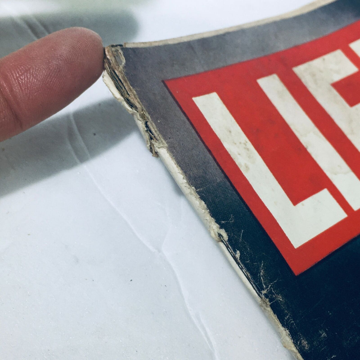 Close-up view of the vintage Life Magazine January 4, 1963, showcasing minor wear on the edges, highlighting its authentic vintage character.