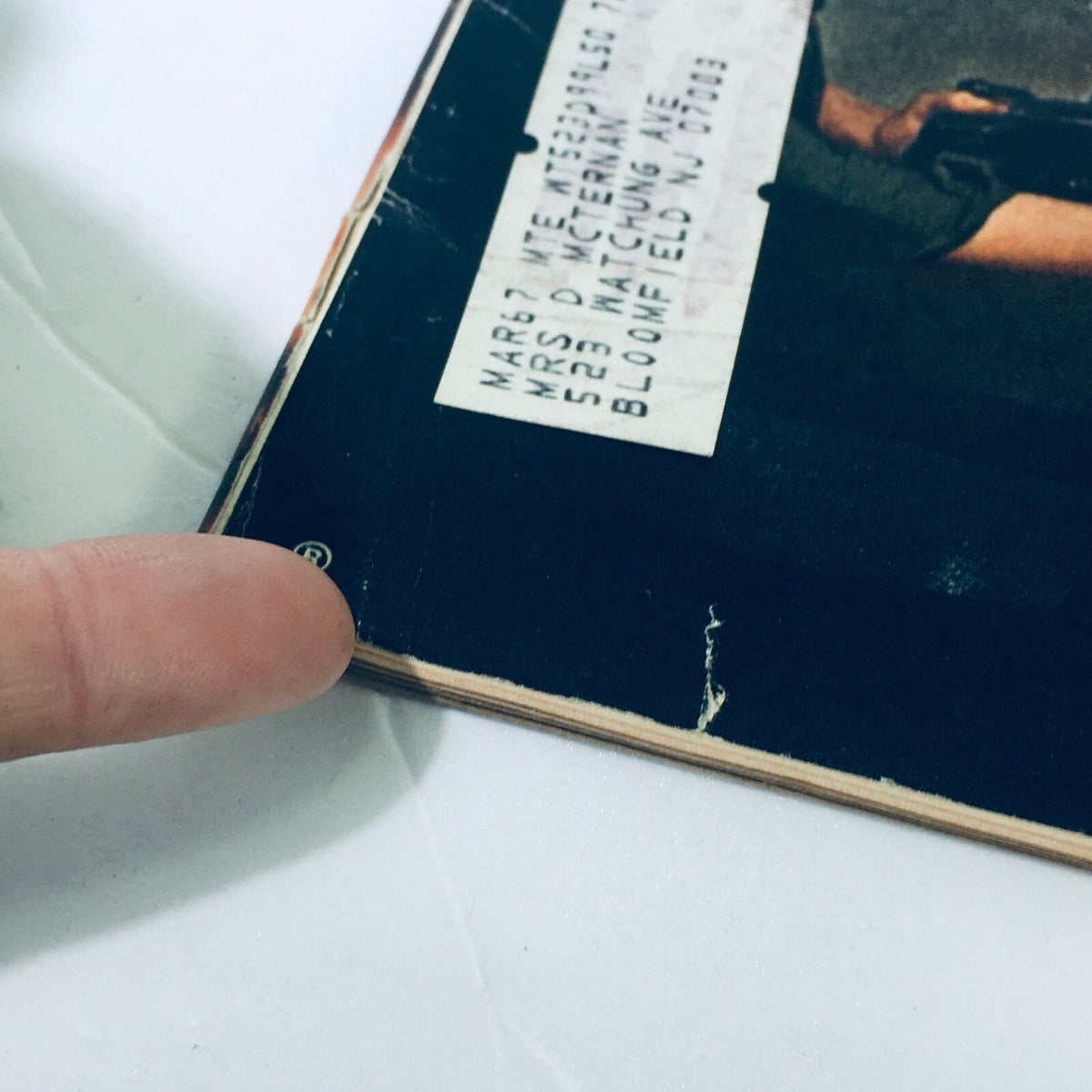 Detail image of the edge of the VTG Life Magazine from January 13, 1967, showing a personal address label and minor wear, emphasizing its vintage condition.