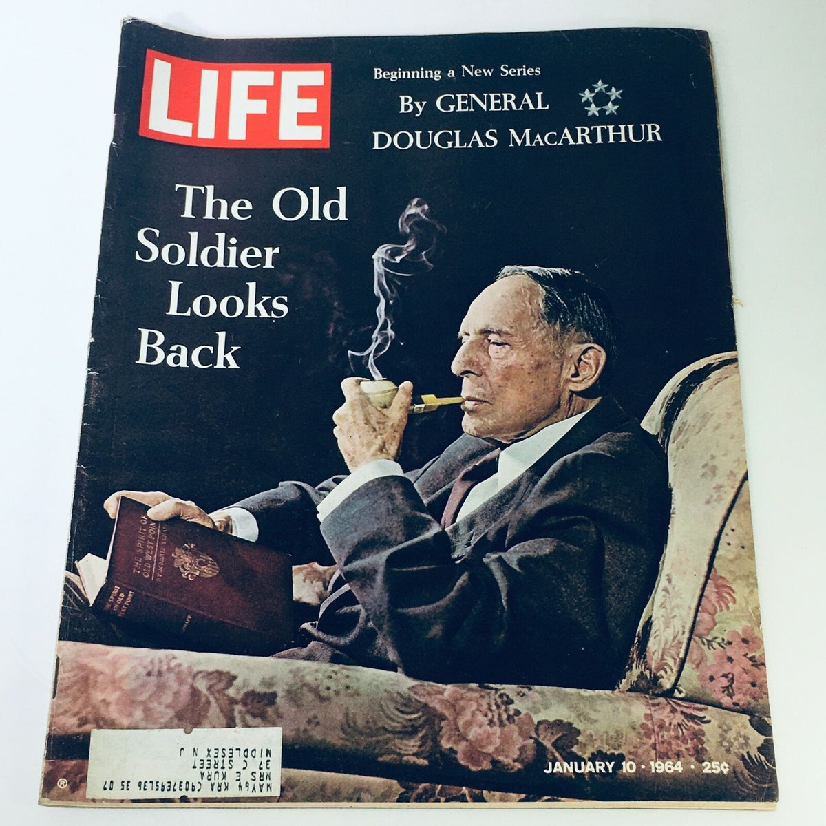 Cover of the Life Magazine January 10 1964, featuring General Douglas MacArthur smoking a pipe, with the title 'The Old Soldier Looks Back', marking the beginning of a new series.