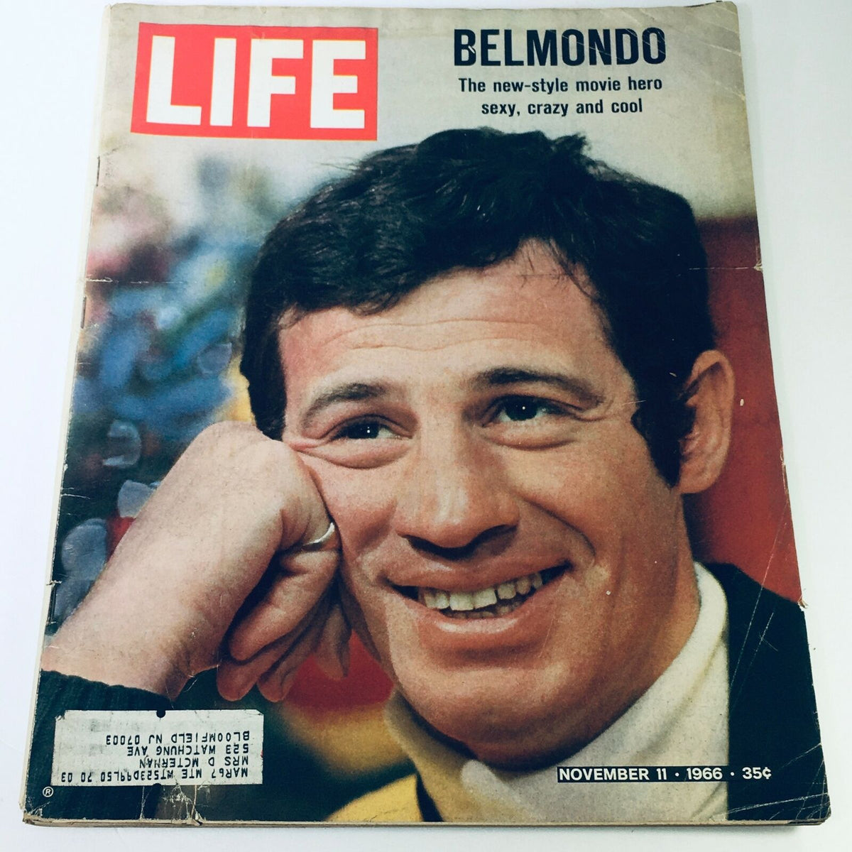 Cover of VTG Life Magazine from November 11, 1966 featuring French actor Jean-Paul Belmondo, showcasing a smiling portrait and the headline 'The new-style movie hero sexy, crazy, and cool.'