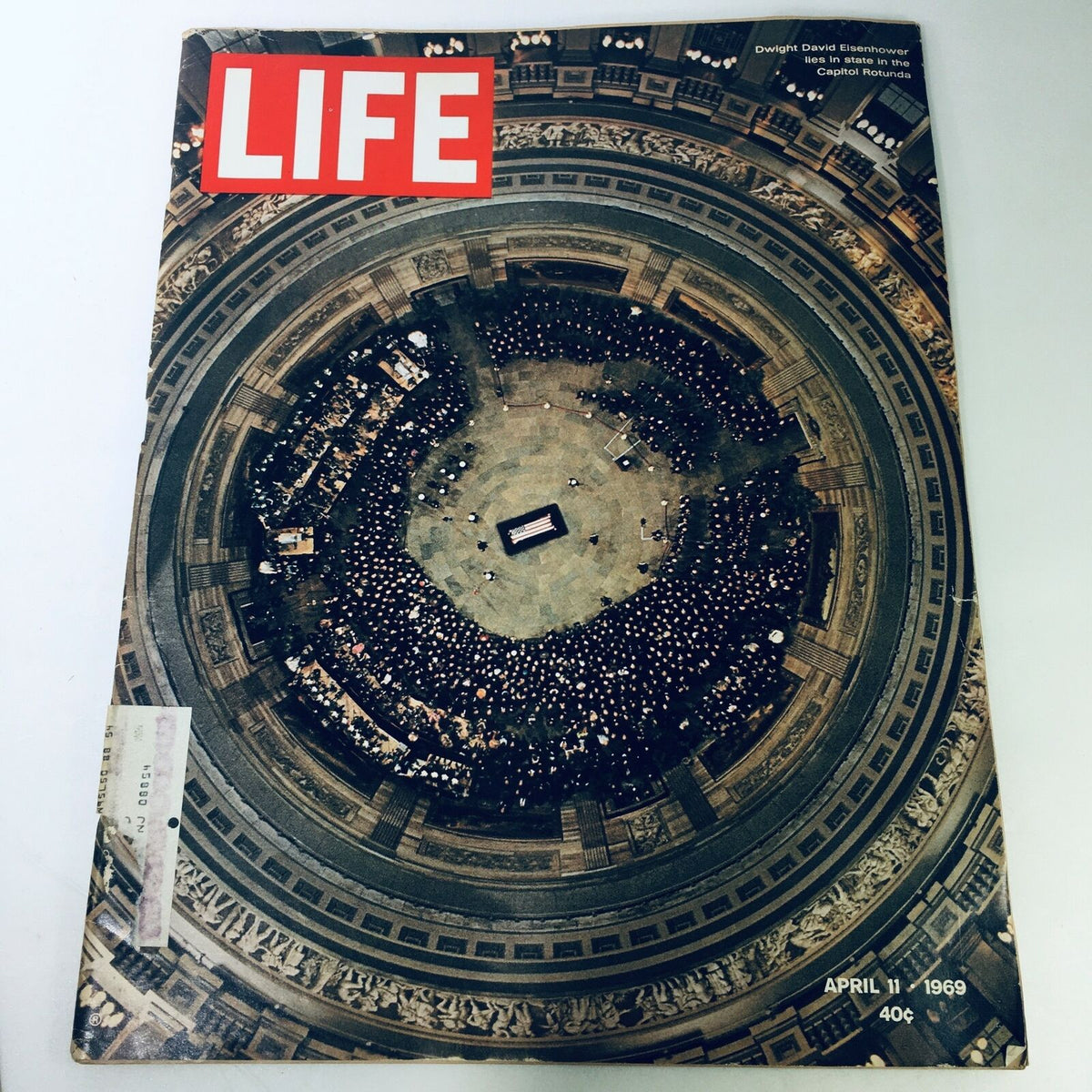VTG Life Magazine cover from April 11, 1969, depicting the wake of Dwight David Eisenhower in the Capitol Rotunda, showcasing a large crowd gathered to pay their respects.
