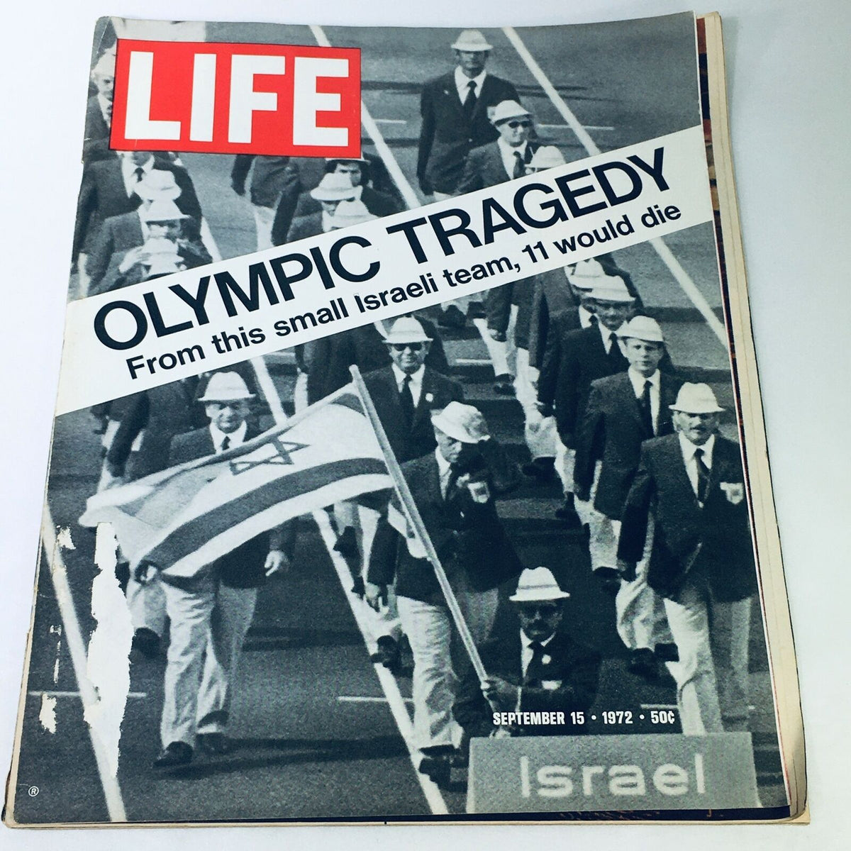 Vintage Life Magazine cover from September 15, 1972, featuring the title 'Olympic Tragedy - From this small Israeli team, 11 would die' with an image of Israeli athletes carrying their flag during the Olympics.