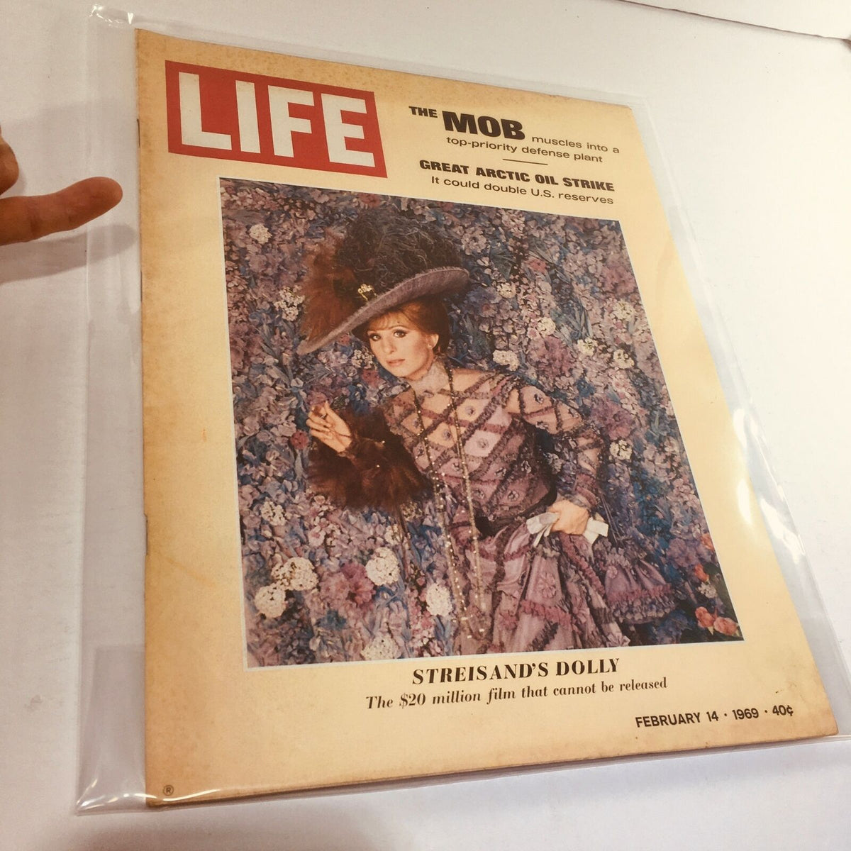 Close-up of the cover of VTG Life Magazine February 14, 1969, showcasing Barbara Streisand's portrayal in 'Hello, Dolly!' and details about the Great Arctic Oil Strike.