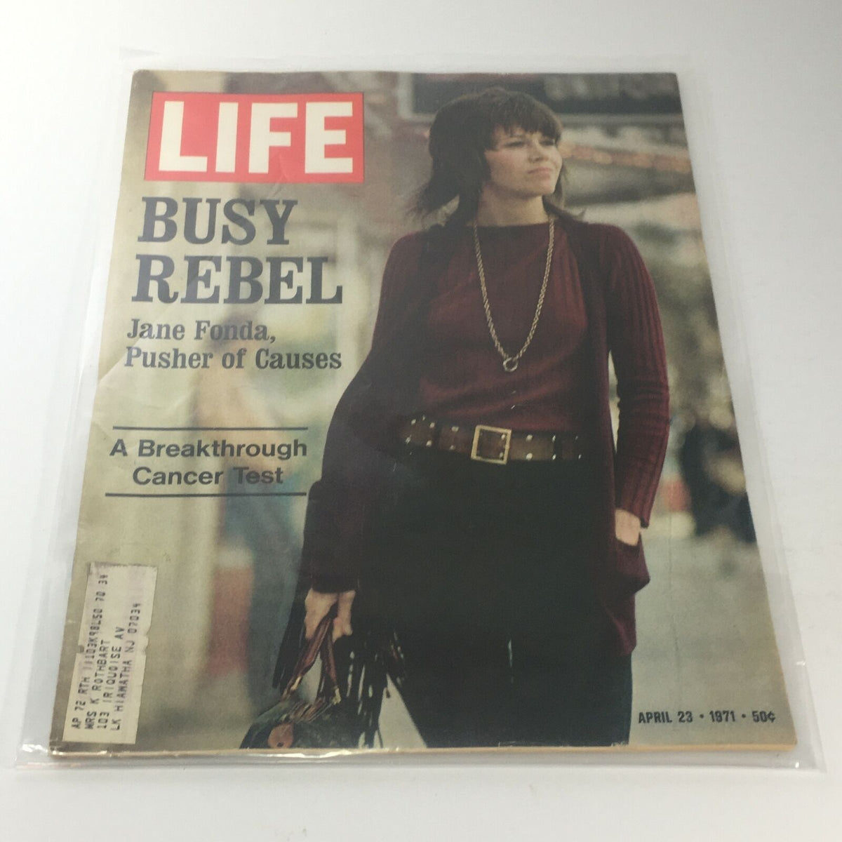 VTG Life Magazine Cover featuring Jane Fonda, titled 'Busy Rebel: Jane Fonda, Pusher of Causes', from April 23, 1971, showcasing a vintage style with a woman in a burgundy top and unique accessories.