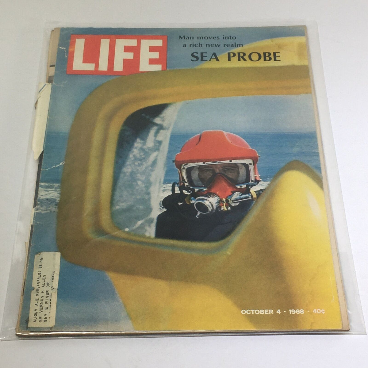 Cover of VTG Life Magazine: Sea Probe - Man Moves Into A Rich New Realm - October 4 1968, featuring a diver in a red helmet reflected in a yellow frame.