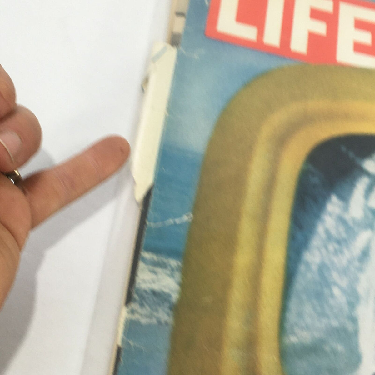Close-up of the spine and side of VTG Life Magazine: Sea Probe - October 4 1968, showing minor wear and an address label.