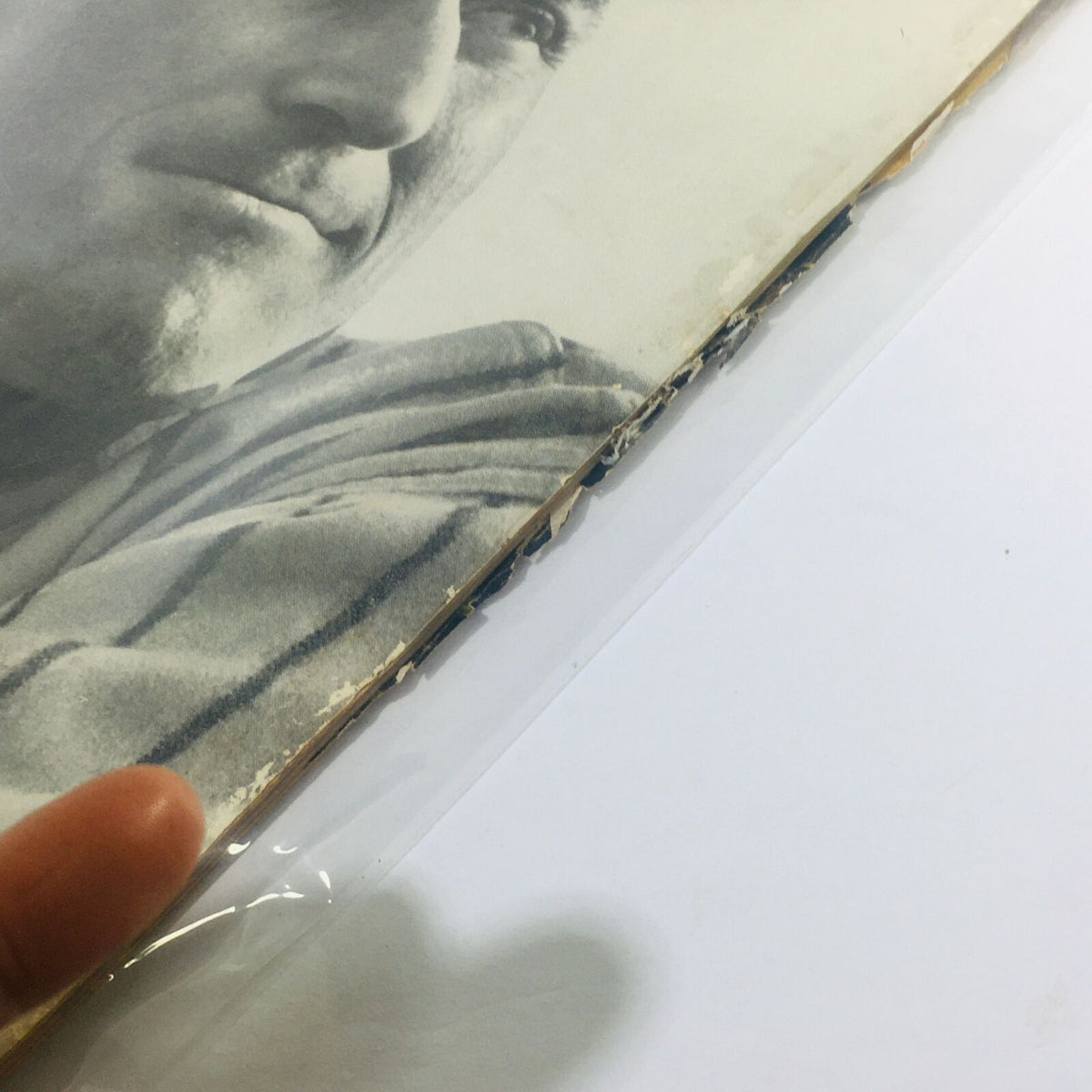 Close-up of the edge of the vintage Life Magazine from May 2, 1949. The magazine displays wear and age lines, indicative of its history, with the title 'Eight-Letter Man at West Point: Arnold Galiffa' clearly visible.