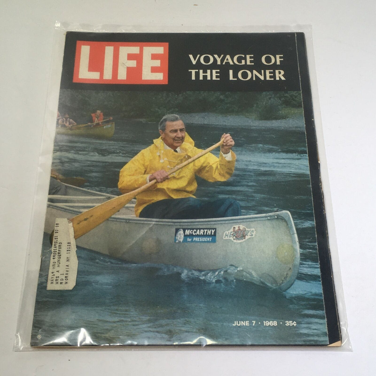 Vintage Life Magazine cover from June 7, 1968, featuring the title 'Voyage Of The Loner' with a man in a yellow raincoat paddling a canoe, showcasing Eugene McCarthy's presidential campaign.