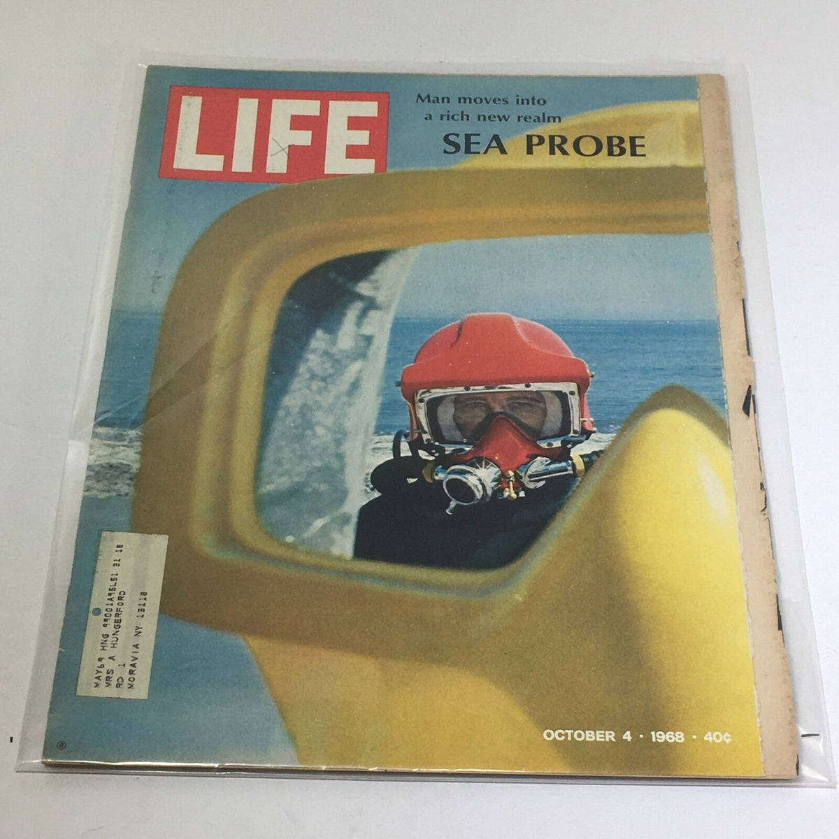Cover of VTG Life Magazine titled 'Sea Probe: Man Moves Into A Rich New Realm', dated October 4, 1968, showcasing a diver in a red helmet reflecting in a yellow frame with ocean backdrop.