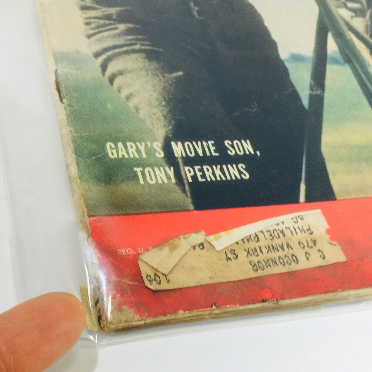 Detailed view of the corner of the VTG Life Magazine from July 16, 1956, showing wear and an address label, emphasizing its unique history.