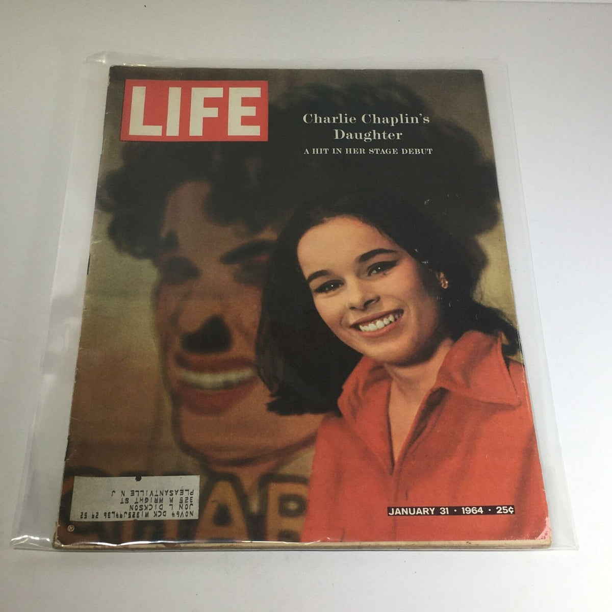 Vintage Life Magazine cover from January 31, 1964, showcasing Charlie Chaplin's daughter and her stage debut, featuring colorful graphics and nostalgic appeal.