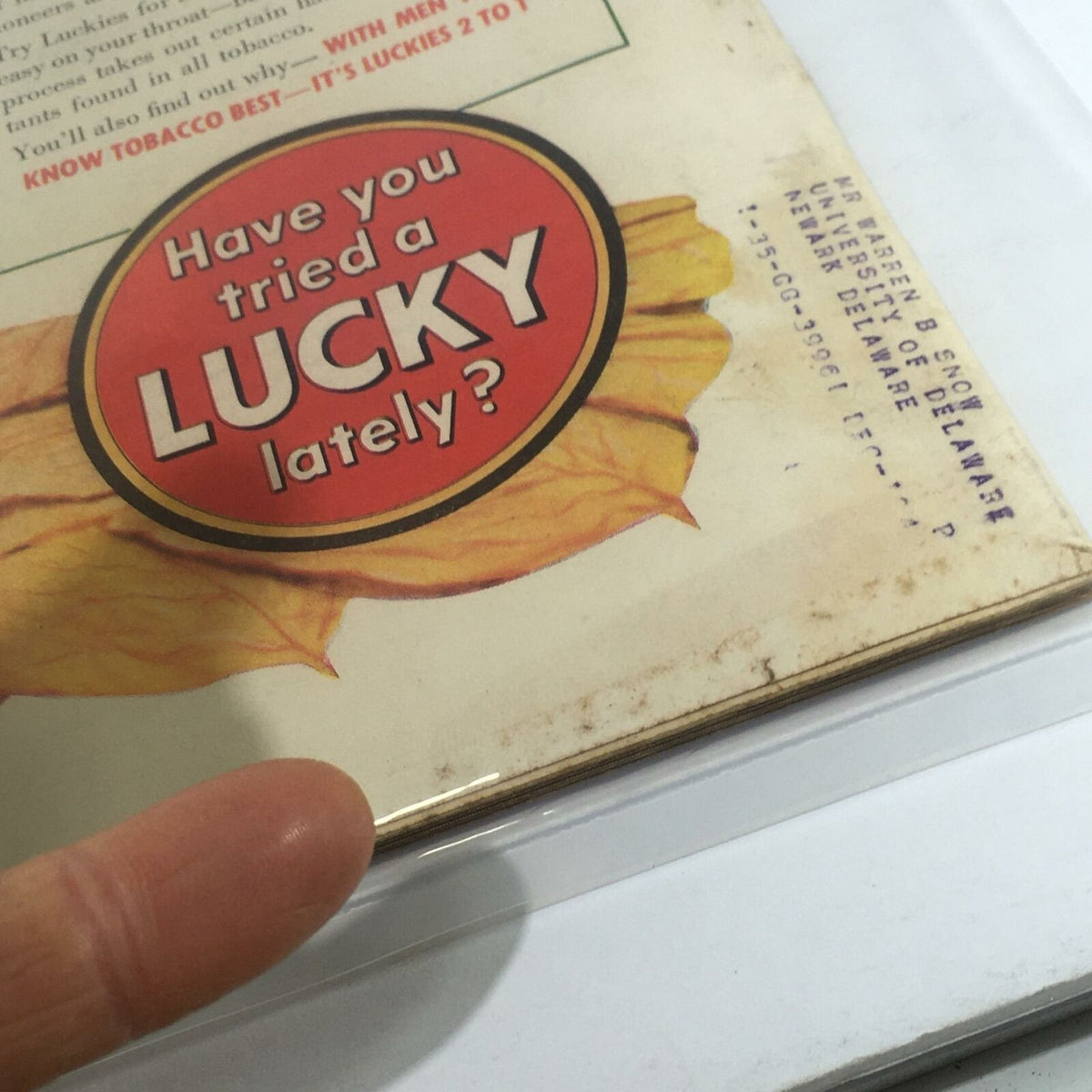 Close-up of the back cover of the Vintage Life Magazine from February 5, 1940, featuring a promotional advertisement for Lucky cigarettes against a backdrop of vintage design elements.