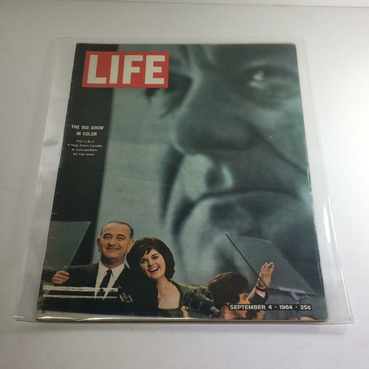VTG Life Magazine Cover from September 4, 1964 featuring the headline 'The Big Show In Color' with a prominent image of L.B.J. embracing Lydia, capturing a historic moment from the 1960s.