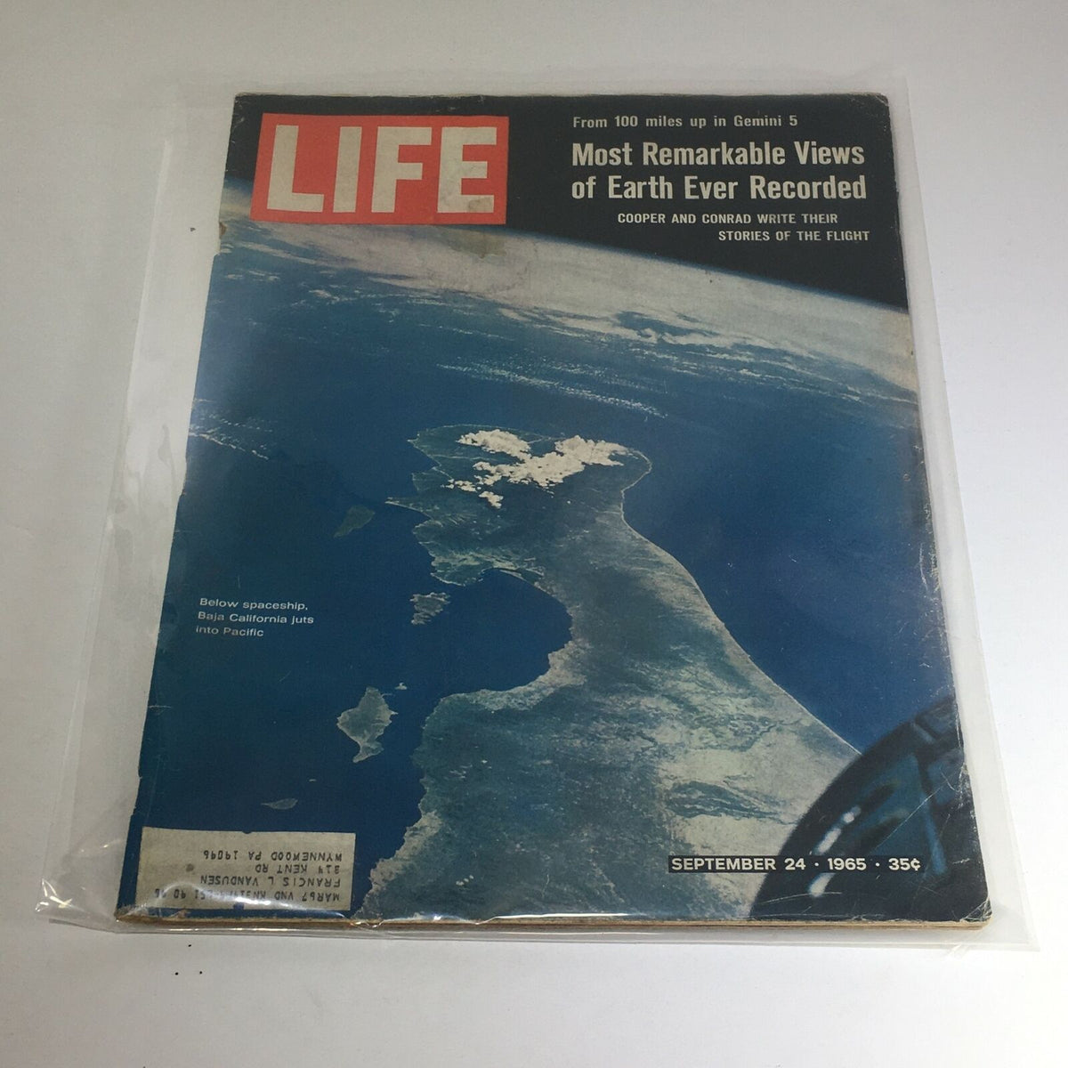 Cover of the VTG Life Magazine from September 24, 1965, featuring captivating views of Earth recorded during the Gemini 5 mission. The magazine showcases an aerial photograph of Earth, highlighting Baja California, and includes details like the price of 35 cents.