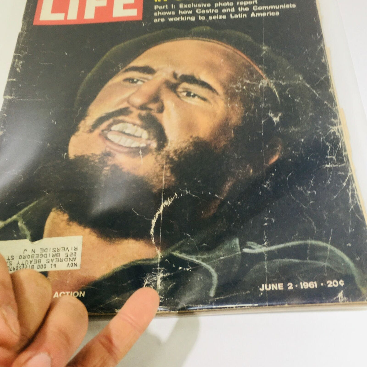 Close-up of the cover of VTG Life Magazine from June 2, 1961, highlighting the title 'The Crisis in Our Hemisphere' and a portrait of Fidel Castro. The magazine's condition shows creases and an address label.