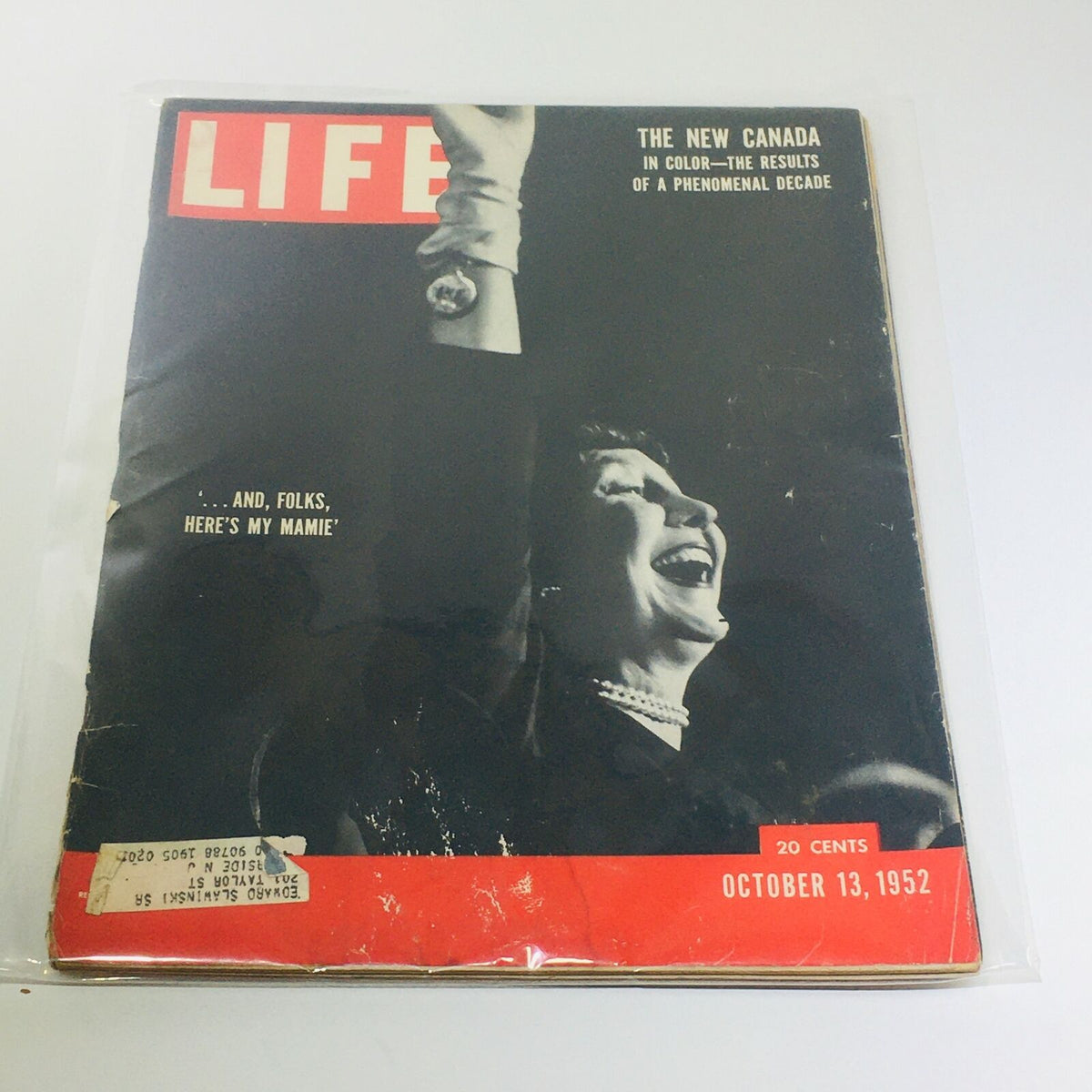 VTG Life Magazine: Oct 13 1952 cover featuring Mamie Eisenhower with a joyful expression and a headline that reads '... and, folks, here's my Mamie.' The magazine is protected by a plastic covering.