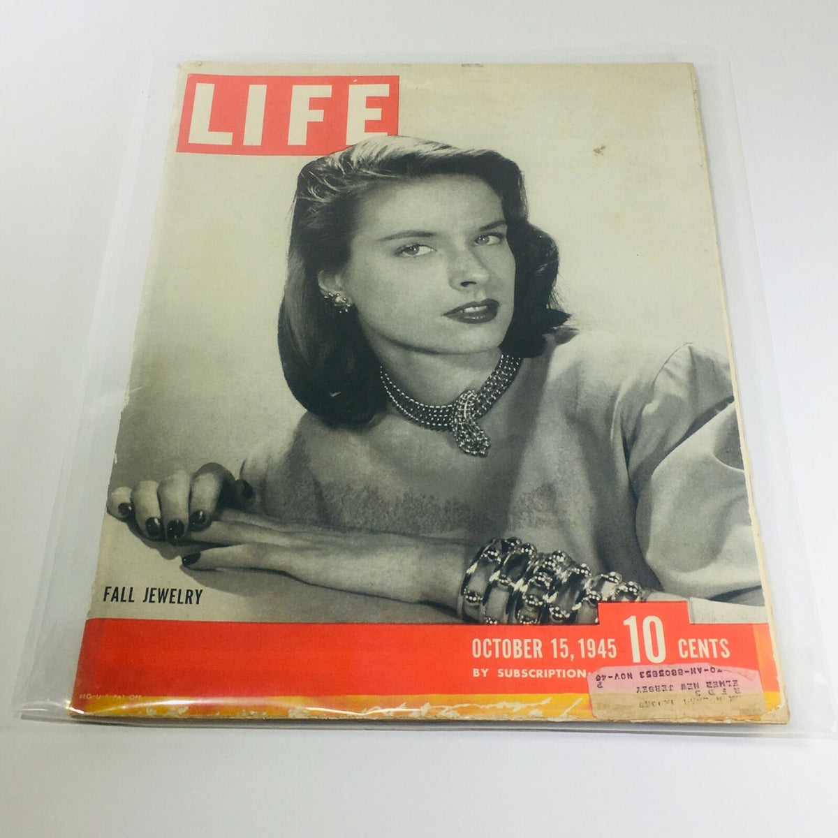 VTG Life Magazine Cover from October 15, 1945 featuring a model wearing fall jewelry, showcasing an era of vintage fashion and style.