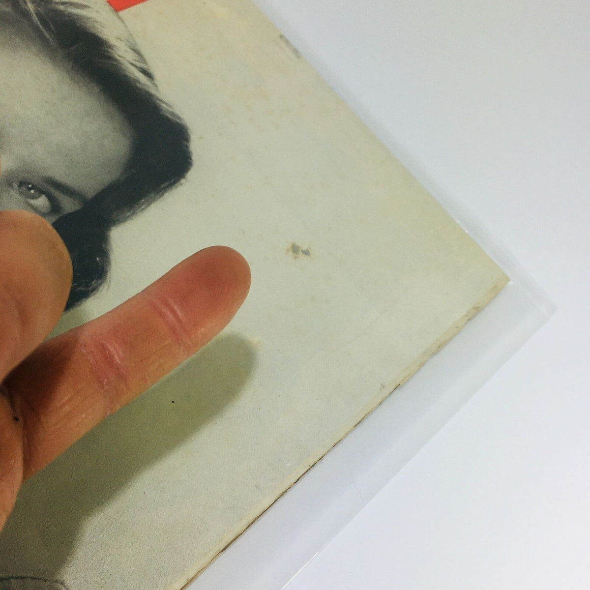 Back cover view of VTG Life Magazine from October 15, 1945, displaying minor wear and a finger indicating condition details, ideal for vintage publication collectors.