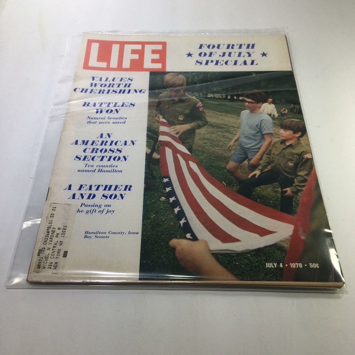 Cover of Life Magazine: July 4, 1970 - Fourth of July Special: Values Worth Cherishing. The magazine showcases boys holding an American flag while dressed in Boy Scout uniforms, highlighting themes of patriotism and unity.