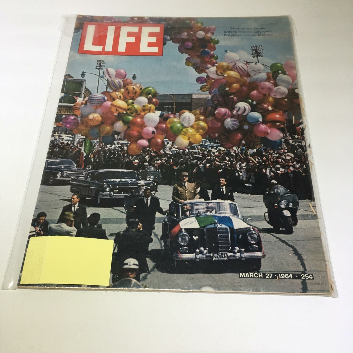 Cover of VTG Life Magazine dated March 27, 1964, featuring a parade scene with Charles de Gaulle and President Lopez Mateos, adorned with colorful balloons.