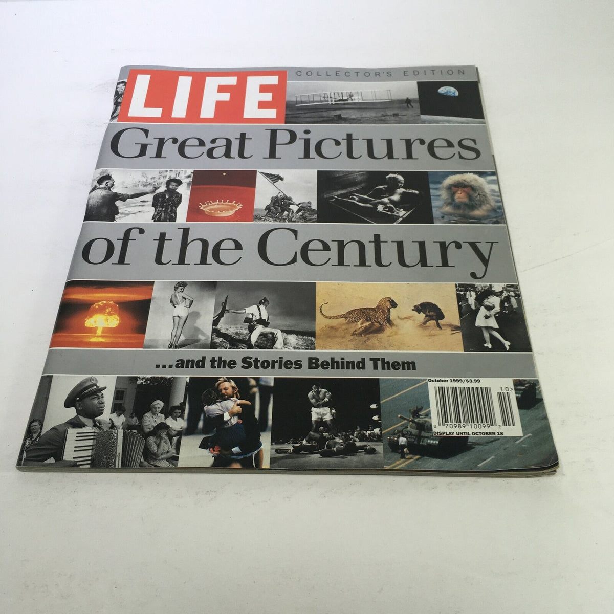 Cover of Life Magazine, October 1999 edition titled 'Great Pictures of the Century and the Stories Behind.' Features a collage of iconic historical images, including a mushroom cloud, people in various historic contexts, and notable events from the 20th century.