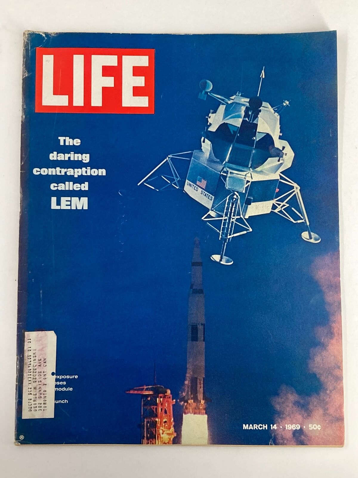 Cover of VTG Life Magazine dated March 14, 1969, featuring the daring contraption known as LEM with a spacecraft and launch scene.