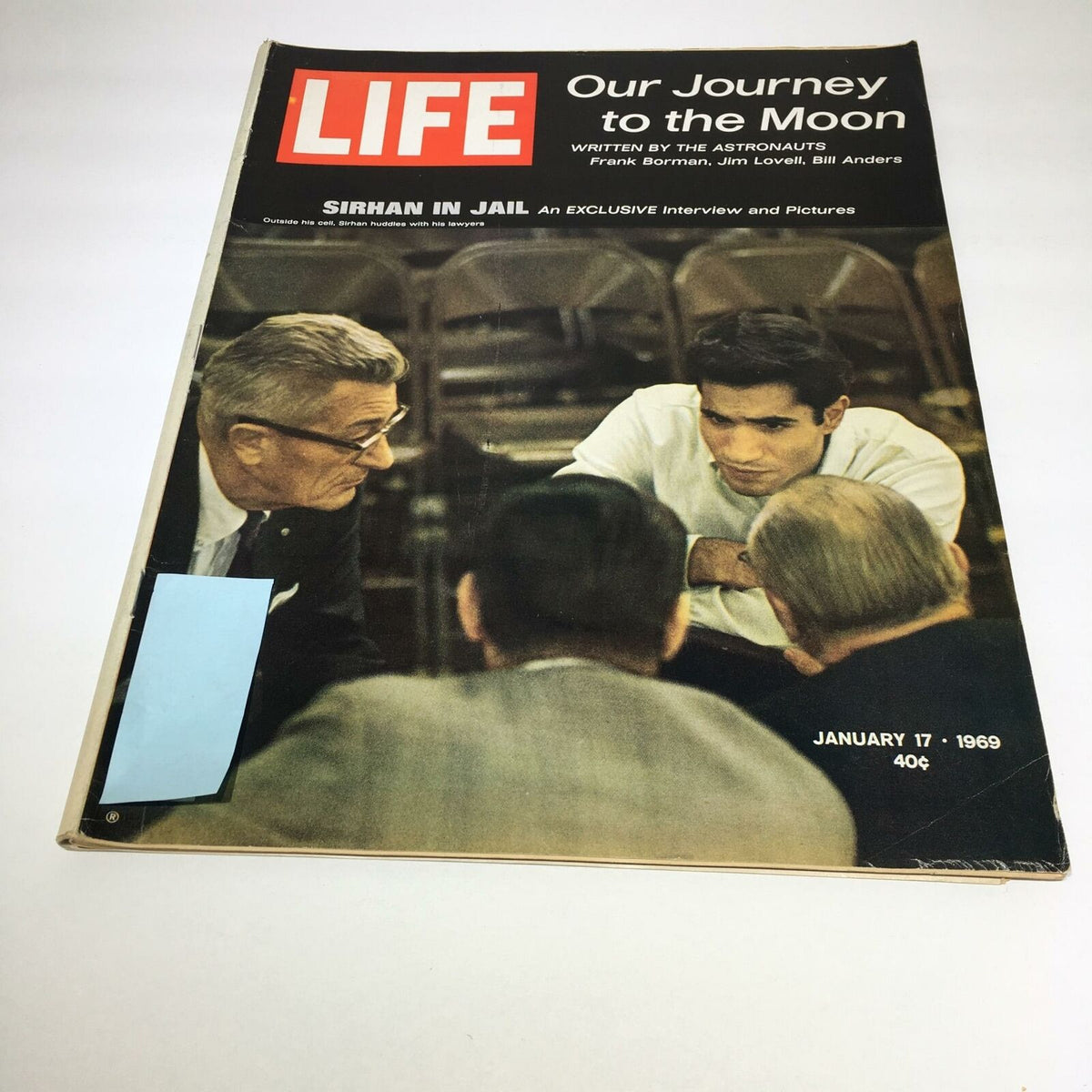 Vintage Life Magazine from January 17, 1969, featuring the cover story 'Our Journey to the Moon' with an exclusive look at Sirhan Huddles. The cover includes images of Sirhan in jail and highlights key interviews with astronauts.