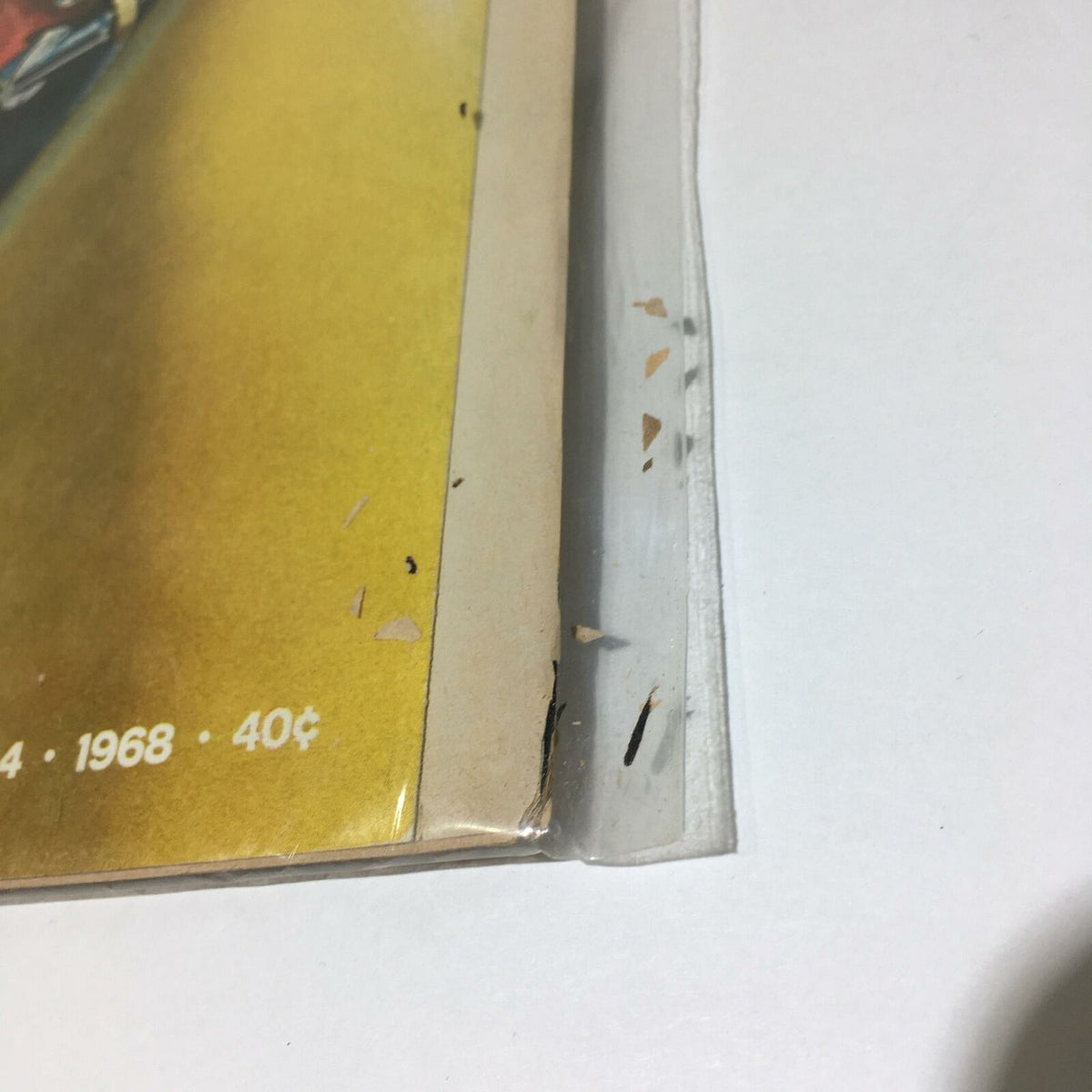 Side view of the vintage Life Magazine from October 4 1968, highlighting the worn edges and label, indicating its vintage condition.