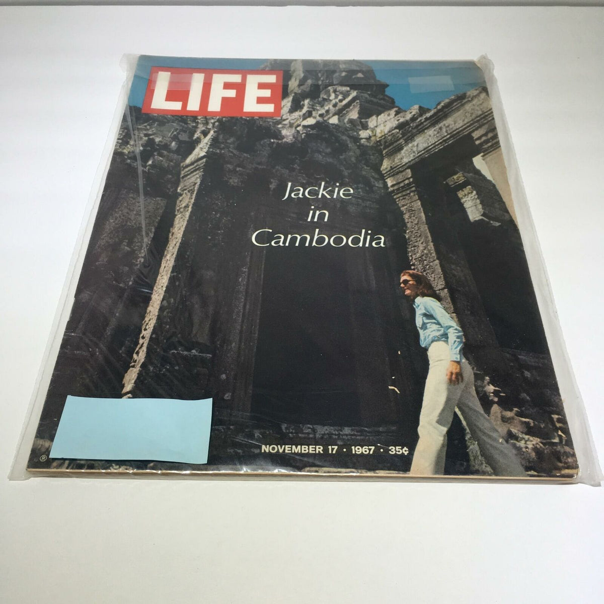 Cover of the vintage Life Magazine from November 17, 1967, featuring Jackie Kennedy during her visit to Cambodia, showcasing iconic imagery from the era.