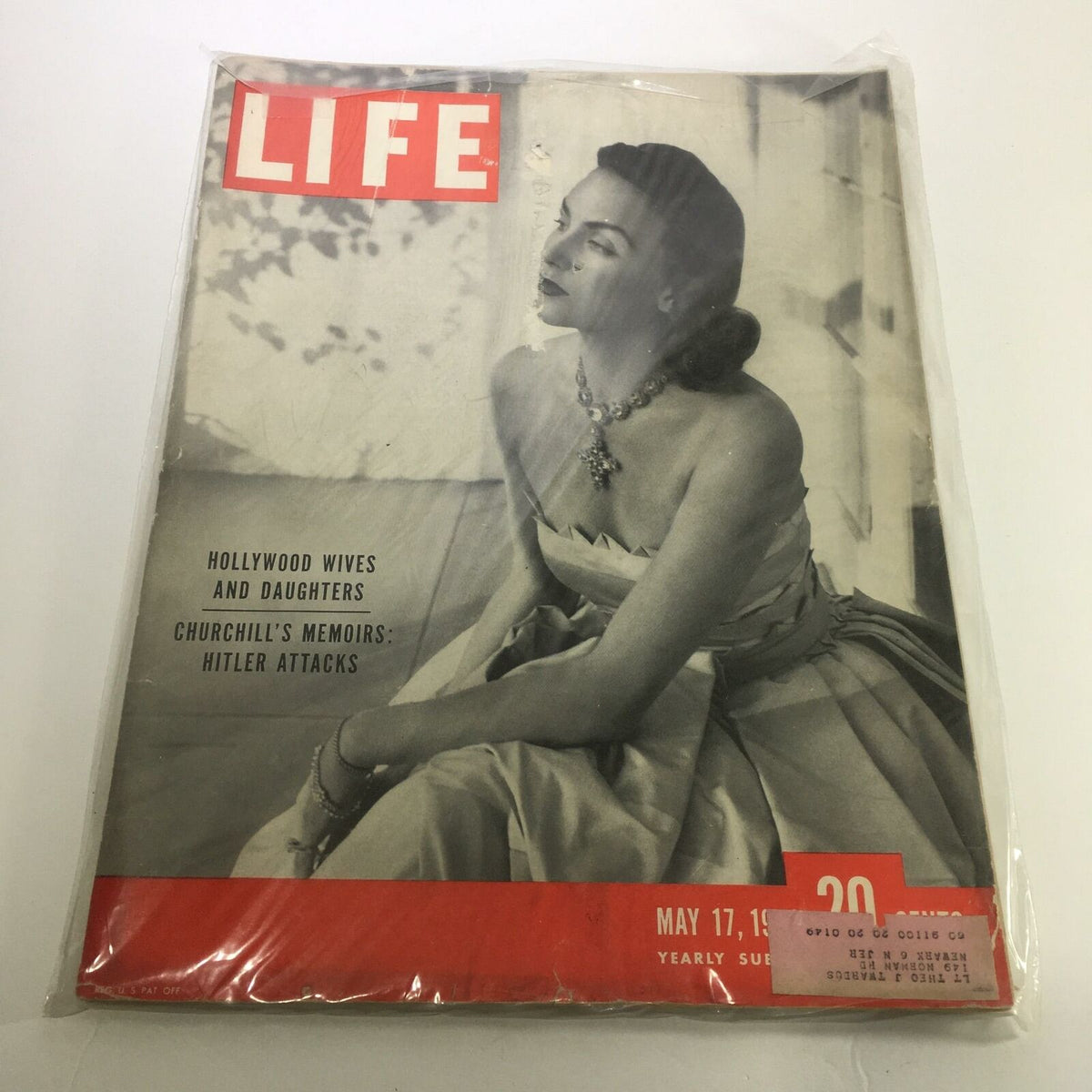 Cover of Life Magazine dated May 17, 1948, featuring the headline 'Hollywood Wives and Daughters' and a portrait photograph of a woman in a stylish dress, emphasizing vintage glamour.