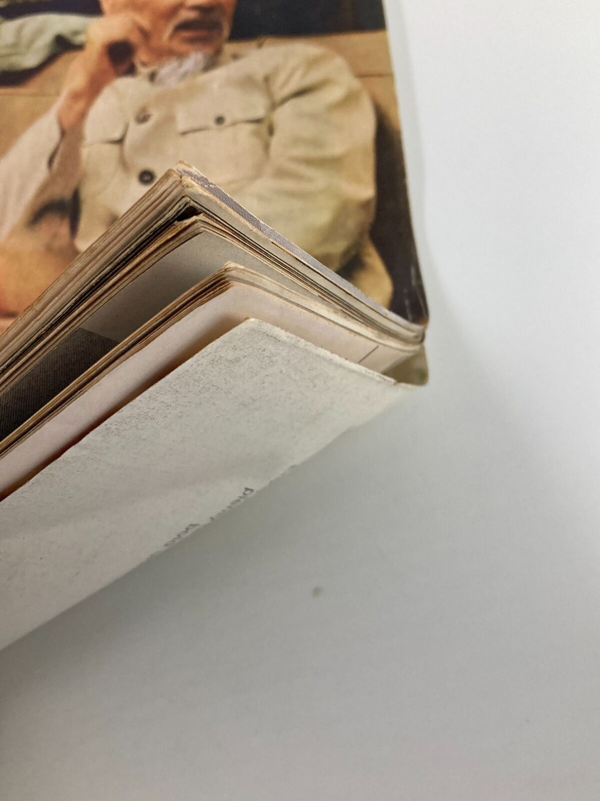 Side view of the binding of VTG Life Magazine from January 14, 1966, showcasing its vintage wear and character.