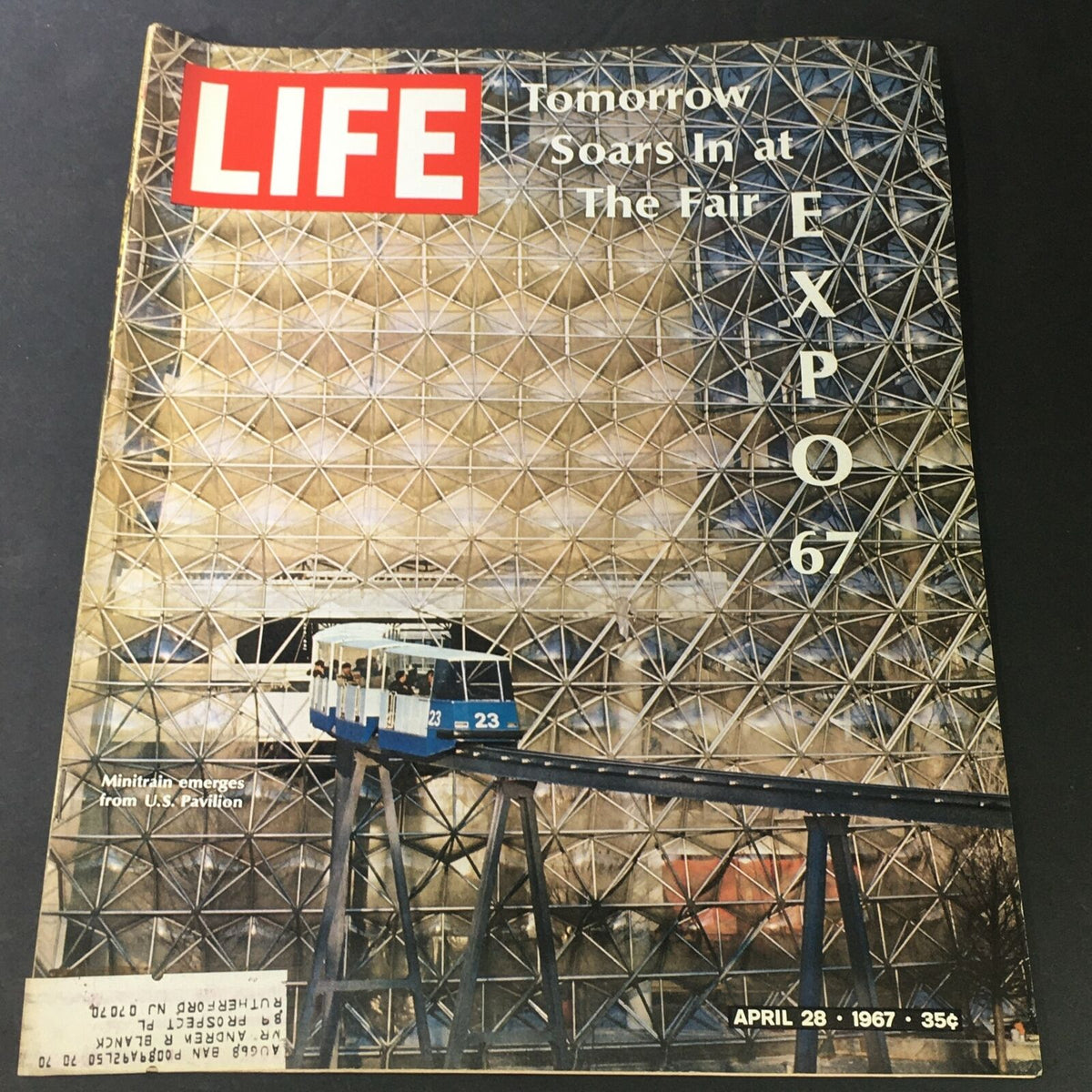 VTG Life Magazine April 28 1967 cover featuring the Minitrain emerging from the US Pavilion at Expo 67, showcasing architectural design and historical significance.