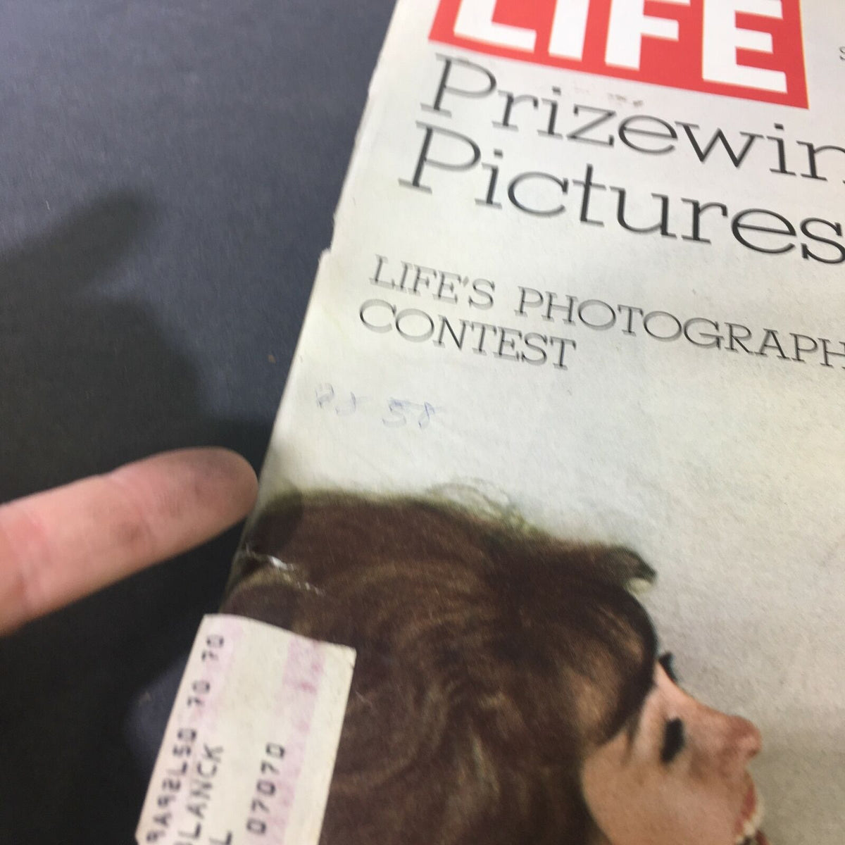 Detailed view of the top of the vintage Life Magazine cover from December 25, 1970, displaying the title 'Life's Photography Contest Prizewinning' and handwritten notes.