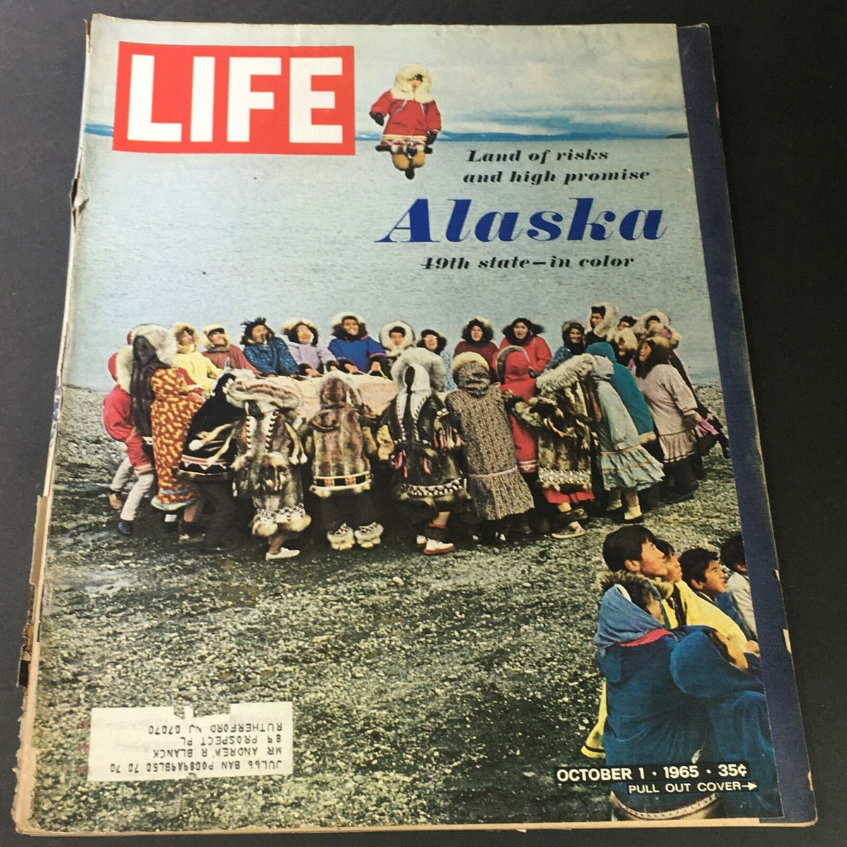 Cover of VTG Life Magazine October 1 1965 featuring Alaska, showcasing a group of people in traditional attire against a scenic backdrop, labeled with 'Land of risks and high promise' and '49th state in color'.