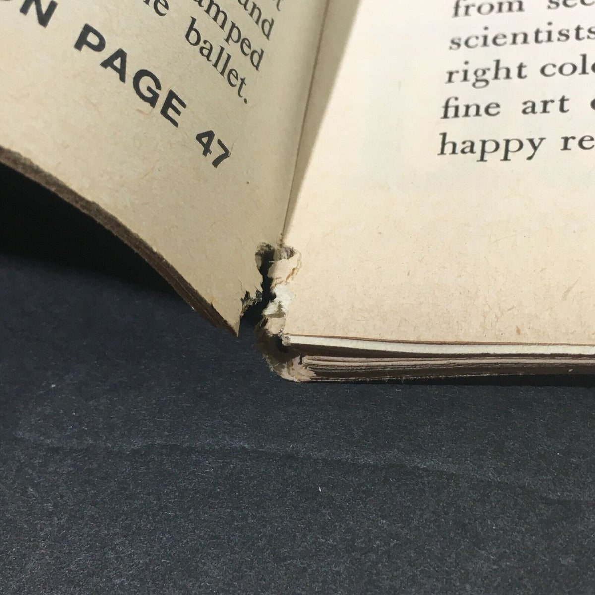 Image of the spine of the VTG Life Magazine dated October 25, 1963, illustrating a tear and damage, reflecting its age and collectible state.