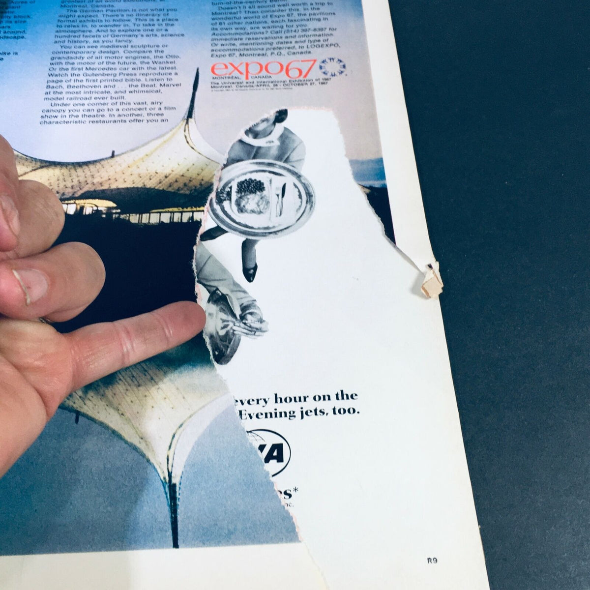 Interior page of VTG Life Magazine June 2 1967 showing a torn advertisement with a hand pointing to the tear, indicating the magazine's vintage condition.