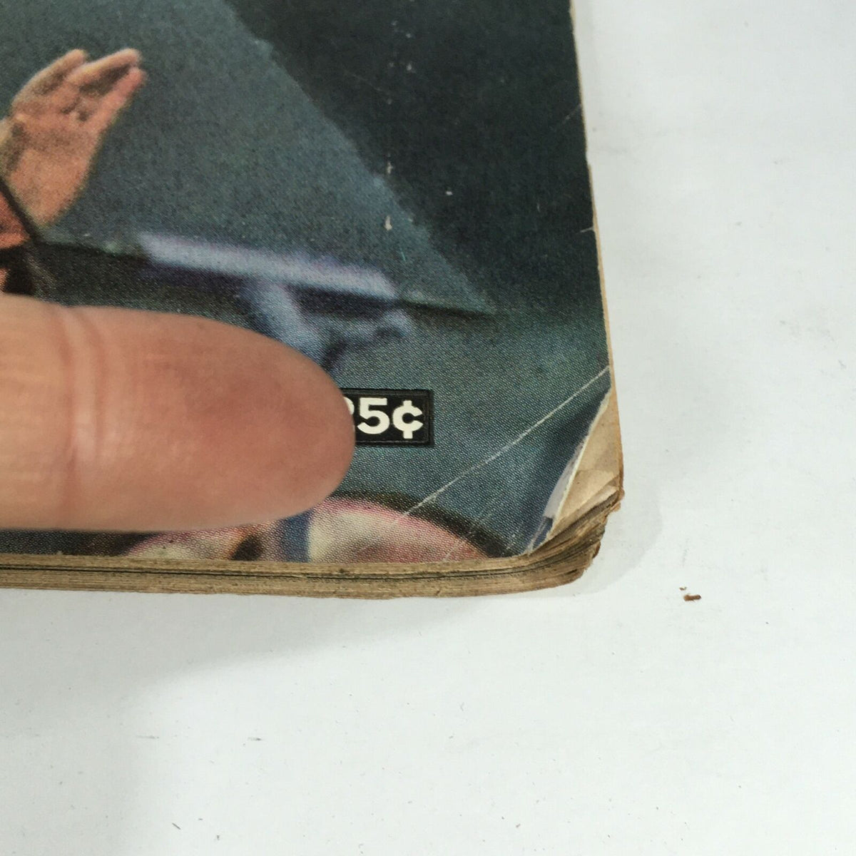 Detail shot of the price tag on the cover of VTG Life Magazine September 4, 1964, showing it was sold for 25 cents, reflecting its historical context.