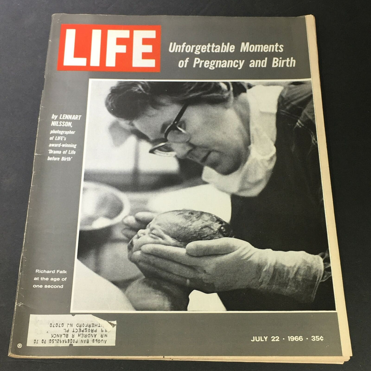 Cover of VTG Life Magazine July 22 1966 featuring the theme 'Unforgettable Moments of Pregnancy and Birth'. The image shows a healthcare professional gently holding a newborn baby, illustrating the emotional significance of childbirth.