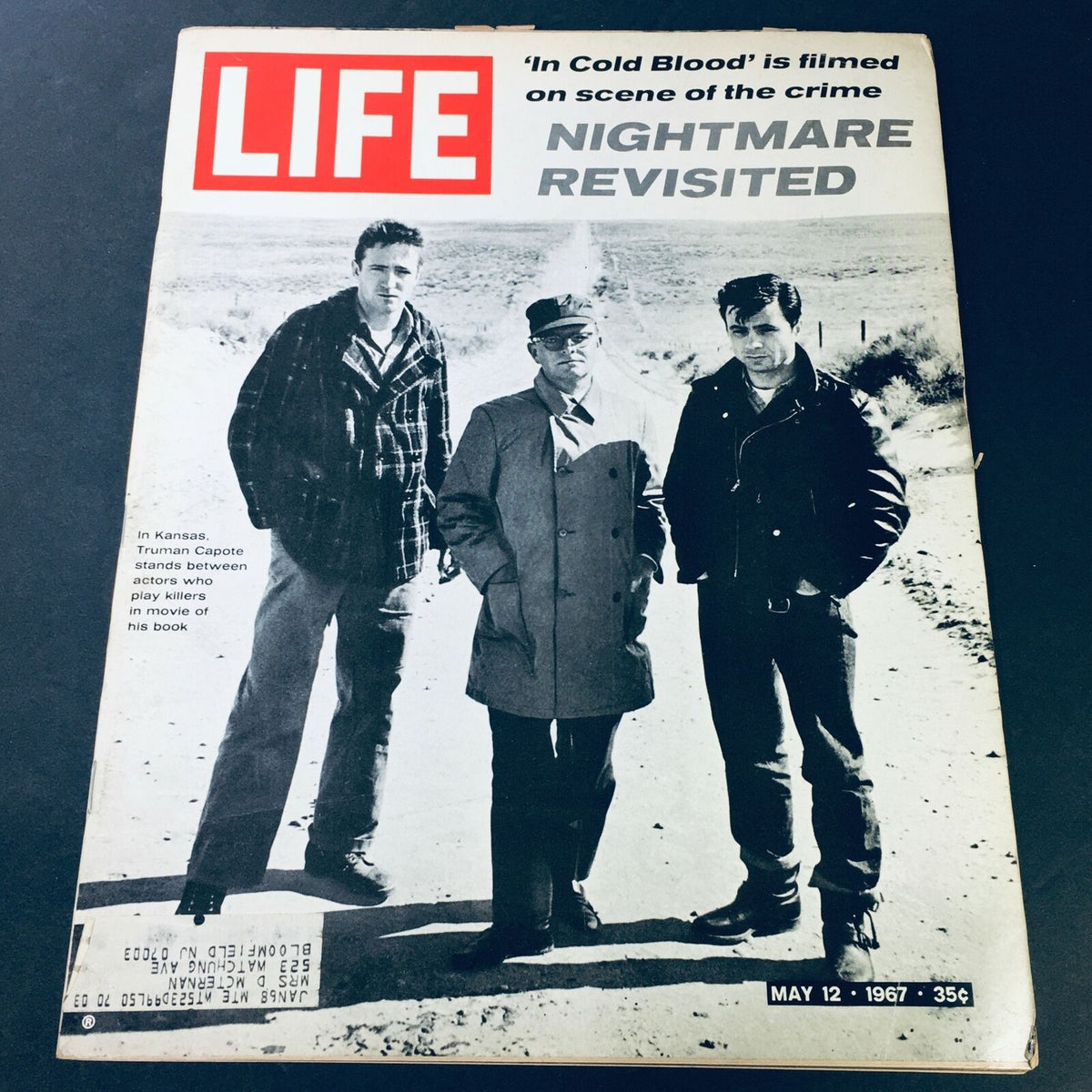 Vintage Life Magazine cover from May 12, 1967 featuring Truman Capote standing between actors from the film adaptation of 'In Cold Blood', showcasing a glimpse into history and literature.