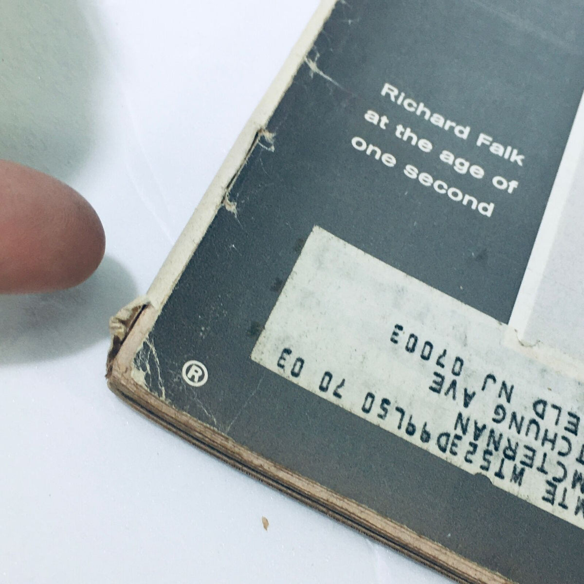 Close-up view of the back cover of a vintage Life Magazine from July 22, 1966, featuring an address label and description about Richard Falk at the age of one second.