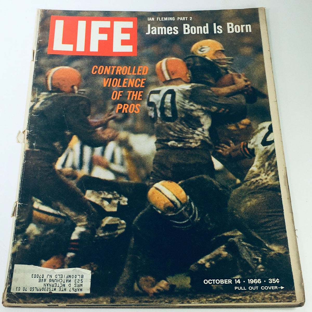 Cover of VTG Life Magazine October 14, 1966 featuring 'James Bond Is Born' by Ian Fleming, showcasing a dynamic sports scene in vibrant colors.