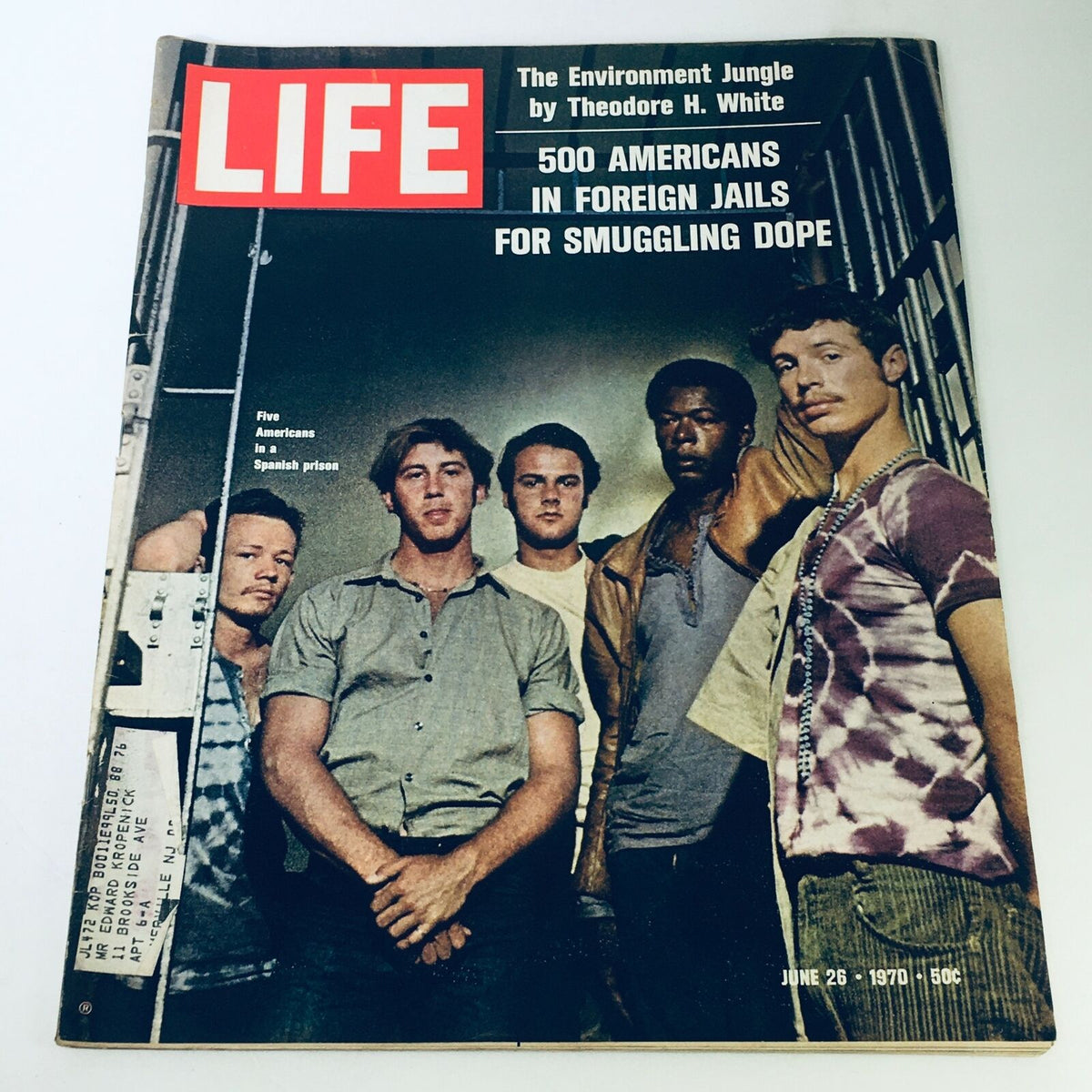 Cover of VTG Life Magazine from June 26, 1970 featuring 'The Environment Jungle' by Theodore H. White, highlighting five Americans in various attire against a backdrop suggesting foreign jails.
