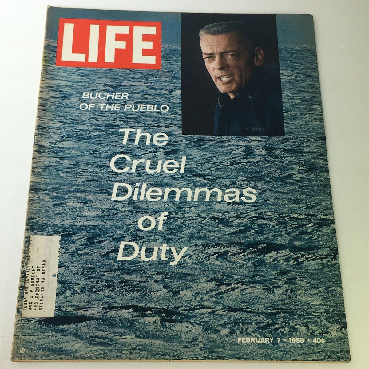 VTG Life Magazine Cover from February 7, 1969 featuring Lloyd M. Bucher of The Pueblo, highlighting 'The Cruel Dilemmas of Duty', with a backdrop of ocean waves.