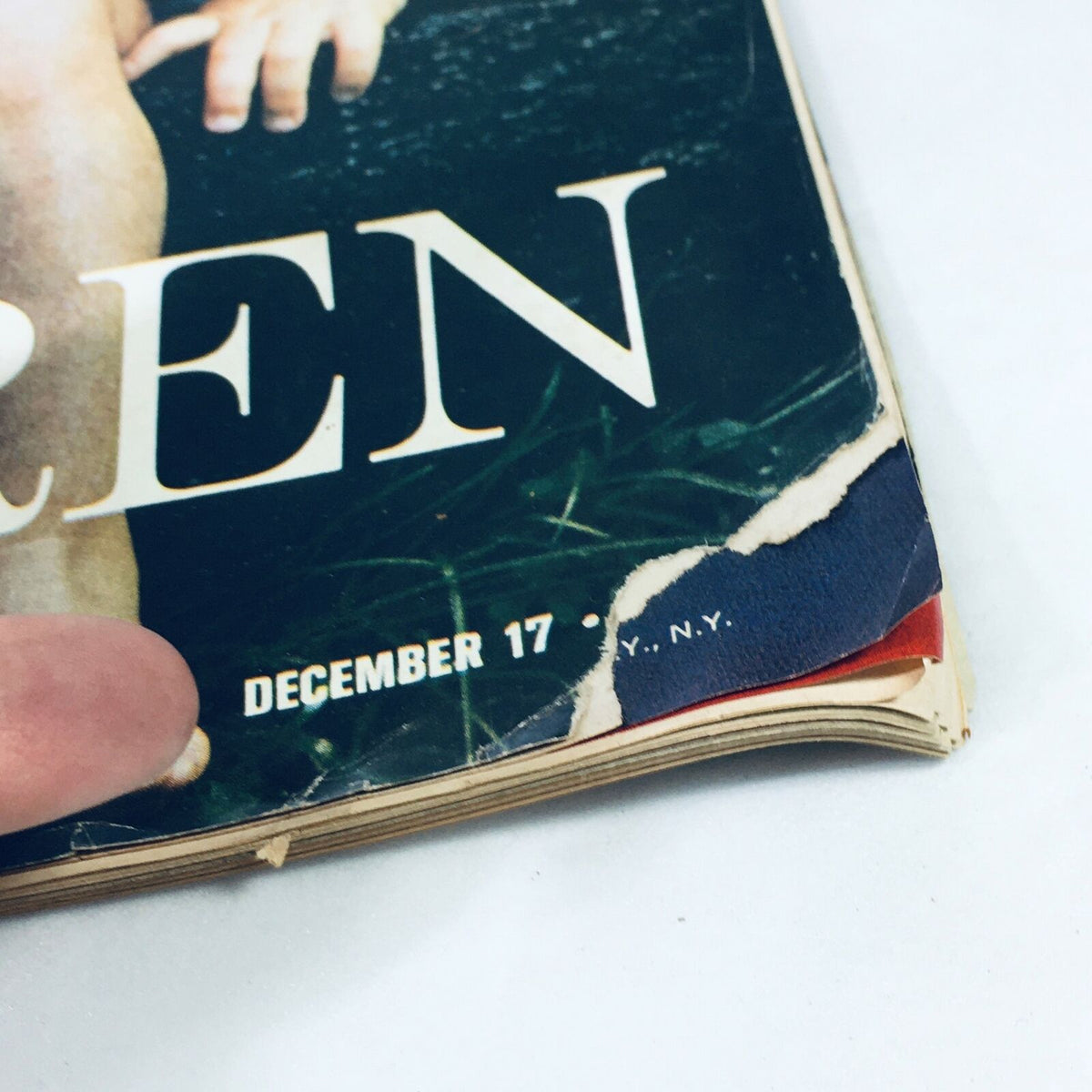 Close-up of the corner of VTG Life Magazine December 17 1971, showing the title 'CHILDREN' and a date marking, depicting slight wear indicative of its vintage condition.