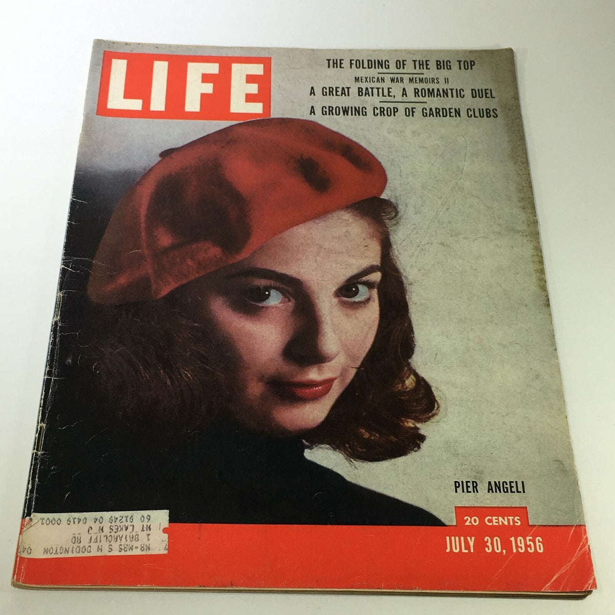 Cover of VTG Life Magazine July 30, 1956 featuring Pier Angeli and the title 'A Romantic Duel'. The magazine showcases a vintage aesthetic with a red beret and offers a glimpse into mid-20th century culture.